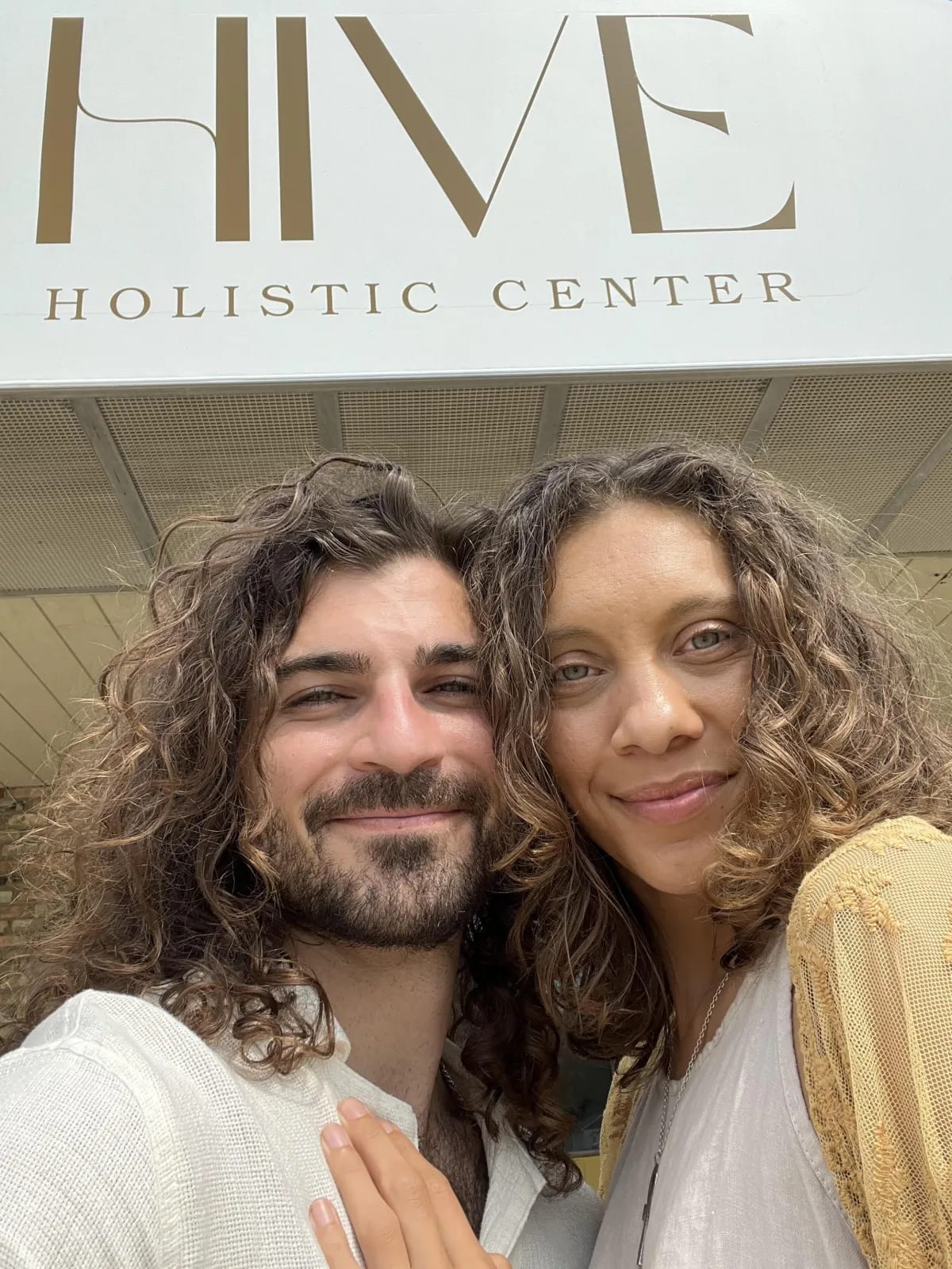 Hunter O'Connor and Alberto Berich, founders of Hive Holistic Center, outside their center in Flint