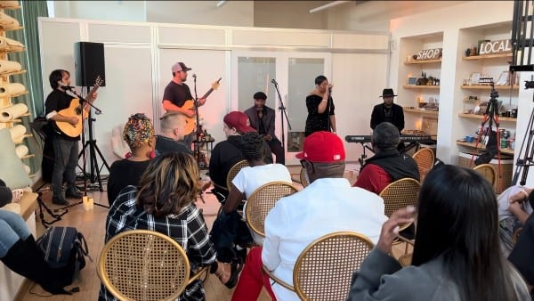 Community gathering with live music at Hive Holistic Center
